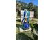 Mermaid statue next to Sarah Hill sign, scenic outdoor setting at 6138 Island Dr, Weeki Wachee, FL 34607