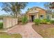 Community mailbox area with brick pathway and landscaping at 133 Villa Preserve Ave, Lutz, FL 33548