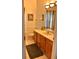 Clean bathroom with wood vanity and tiled floor at 13102 Prestwick Dr, Riverview, FL 33579