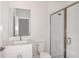 Clean bathroom with single vanity, toilet and shower at 10317 Fieldstone Myrtle Way, San Antonio, FL 33576