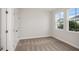 Bright bedroom with neutral walls and carpet at 10317 Fieldstone Myrtle Way, San Antonio, FL 33576