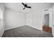 Neutral bedroom with carpet, ceiling fan, and closet at 9120 Warm Springs Cir, Parrish, FL 34219