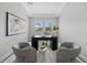 Bright office space with elegant desk, comfortable chairs, and ample natural light at 9120 Warm Springs Cir, Parrish, FL 34219