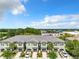 Aerial view of townhome community with a view of surrounding landscape at 11650 Cambium Crown Dr, Riverview, FL 33569
