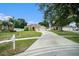 Front view of charming house with driveway and mailbox at 1704 Cresswell Manor Ct, Dover, FL 33527