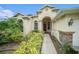 Inviting house exterior with landscaped front yard and walkway at 1704 Cresswell Manor Ct, Dover, FL 33527