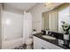Modern bathroom with a shower/tub combo and granite vanity at 700 S Harbour Island Blvd # 722, Tampa, FL 33602
