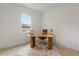 Home office with wood desk and comfortable chair at 15603 Serengeti Blvd, Spring Hill, FL 34610