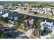 Aerial view of single Gathering home on a canal with lush landscaping at 617 Islebay Dr, Apollo Beach, FL 33572