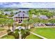 An expansive aerial view of the community clubhouse and surrounding landscape at 617 Islebay Dr, Apollo Beach, FL 33572