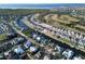 Wide aerial view of waterfront community and golf course at 617 Islebay Dr, Apollo Beach, FL 33572