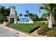 Attractive entrance to the community with lush landscaping and signage at 617 Islebay Dr, Apollo Beach, FL 33572