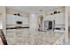 Modern kitchen with granite countertops and stainless steel appliances at 617 Islebay Dr, Apollo Beach, FL 33572