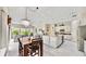Spacious kitchen with island, stainless steel appliances and breakfast area at 617 Islebay Dr, Apollo Beach, FL 33572