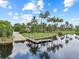 Private boat dock on a tranquil waterway at 5515 Golden Isles Dr, Apollo Beach, FL 33572