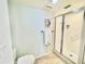 Clean bathroom with shower stall and tiled floor at 3035 Countryside Blvd # 14B, Clearwater, FL 33761