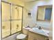 Updated bathroom featuring a shower/tub, sink, and toilet at 3035 Countryside Blvd # 14B, Clearwater, FL 33761