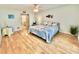 Main bedroom with king bed, ensuite bathroom access at 3035 Countryside Blvd # 14B, Clearwater, FL 33761