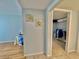 Spacious walk-in closet with ample shelving and hanging space at 3035 Countryside Blvd # 14B, Clearwater, FL 33761