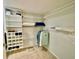 Well-organized closet with shelving and hanging rods at 3035 Countryside Blvd # 14B, Clearwater, FL 33761