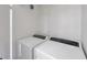 White washer and dryer in dedicated laundry room at 13339 Laraway Dr, Riverview, FL 33579