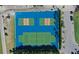 Community pickleball courts with blue and green surface at 9132 Bassett Ln, New Port Richey, FL 34655