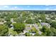 Aerial view of the home and surrounding area at 8402 Bedford Ln, Tampa, FL 33615