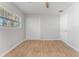 Light bedroom with tile floors and double door closet at 8402 Bedford Ln, Tampa, FL 33615