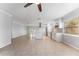 Open concept kitchen with island and stainless steel appliances at 8402 Bedford Ln, Tampa, FL 33615