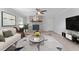 Living room with fireplace, and neutral color palette at 8402 Bedford Ln, Tampa, FL 33615