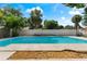 Relaxing swimming pool with a large patio area at 8402 Bedford Ln, Tampa, FL 33615