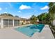 Sparkling swimming pool with a large backyard at 8402 Bedford Ln, Tampa, FL 33615