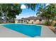 Refreshing swimming pool with a large backyard at 8402 Bedford Ln, Tampa, FL 33615