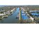 Scenic aerial view of waterfront homes with boat docks and canal access in a beautiful residential neighborhood at 1661 Watermark Ne Cir, St Petersburg, FL 33702