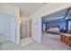 Bathroom with a shower and view of the bedroom at 5112 Coastal Scene Dr, Apollo Beach, FL 33572