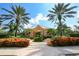 Community bathhouse nestled amongst palm trees at 5112 Coastal Scene Dr, Apollo Beach, FL 33572