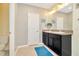 Bathroom with double vanity and separate toilet at 121 Lacewing Pl, Valrico, FL 33594