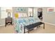 Bright bedroom with large bed and walk-in closet at 121 Lacewing Pl, Valrico, FL 33594