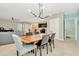 Open concept dining room with a view of the living room and kitchen at 121 Lacewing Pl, Valrico, FL 33594