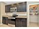 Well-equipped kitchen with ample cabinet space and pantry at 121 Lacewing Pl, Valrico, FL 33594