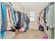 Large walk-in closet with ample hanging space at 121 Lacewing Pl, Valrico, FL 33594