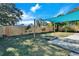 Spacious backyard with shade sail and raised garden bed at 4436 W Wallace Ave, Tampa, FL 33611