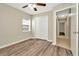 Bright bedroom features a window and a double door closet at 10113 Tarragon Dr, Riverview, FL 33569