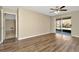 Bedroom featuring wood-look flooring and sliding glass door at 10113 Tarragon Dr, Riverview, FL 33569