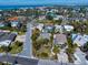 Aerial view of residential neighborhood near the coast at 1401 Bay Palm Blvd, Indian Rocks Beach, FL 33785