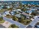 Aerial view of neighborhood, showing the property's location near water at 1401 Bay Palm Blvd, Indian Rocks Beach, FL 33785