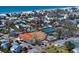 Aerial view of neighborhood park with baseball and tennis courts at 1401 Bay Palm Blvd, Indian Rocks Beach, FL 33785