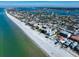 Aerial view of a beautiful beach town with white sand beach and clear waters at 1401 Bay Palm Blvd, Indian Rocks Beach, FL 33785