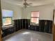 Unfinished bedroom with new flooring and exposed walls at 1401 Bay Palm Blvd, Indian Rocks Beach, FL 33785