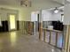 Under construction kitchen with terrazzo floors, ready for renovation at 1401 Bay Palm Blvd, Indian Rocks Beach, FL 33785